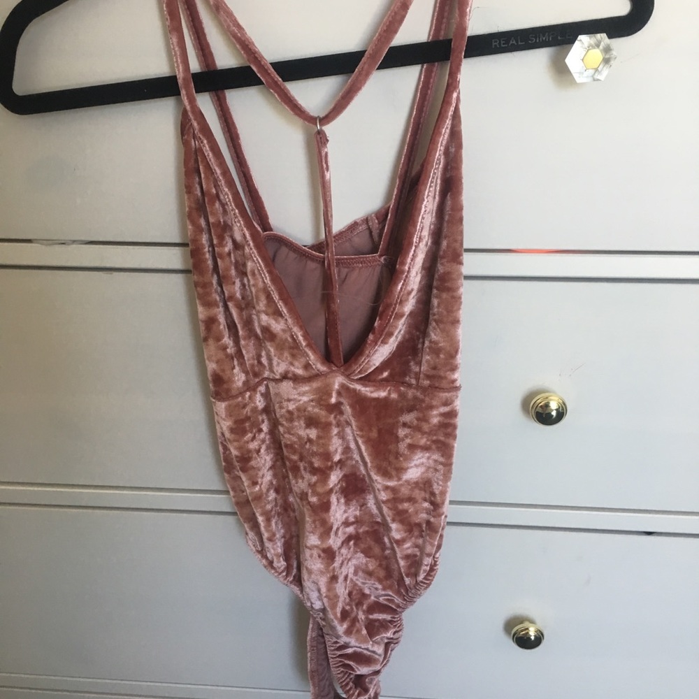 Pink bodysuit
